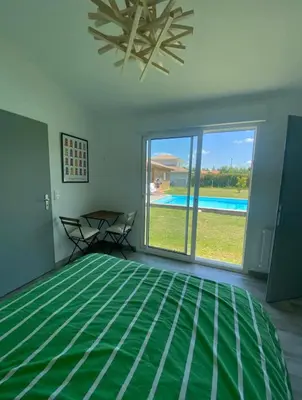 Un ou plusieurs lits dans un hébergement de l'établissement Appartement en pleine nature à 10 minutes de Dax