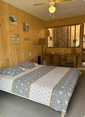 Un ou plusieurs lits dans un hébergement de l'établissement Le chalet du bonheur