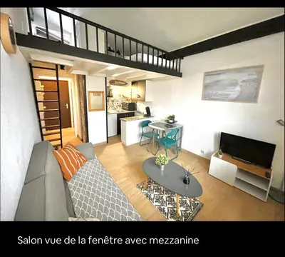 Cuisine ou kitchenette dans l'établissement Appartement en duplex à 50m de la plage avec wifi