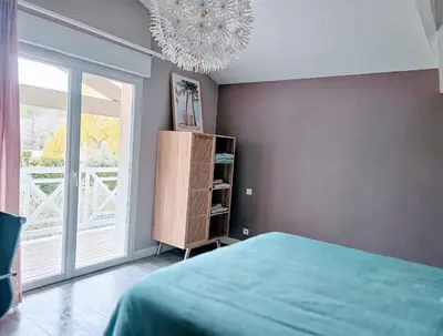 Un ou plusieurs lits dans un hébergement de l'établissement Chambre d'hôtes Landes - Le Clos des Oliviers