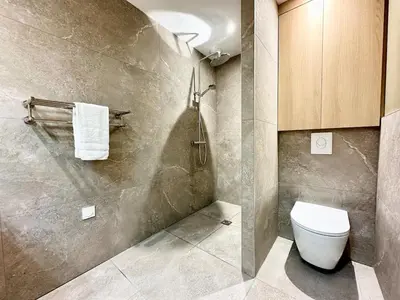 Salle de bains dans l'établissement Sous les Palmiers - Neuf - Parking - Centre - Télé