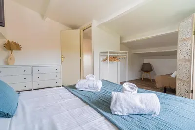 Un ou plusieurs lits dans un hébergement de l'établissement Ecrin Marin - apt terrasse bassin darcachon