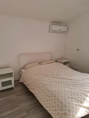 Un ou plusieurs lits dans un hébergement de l'établissement Ateka Dax appartement