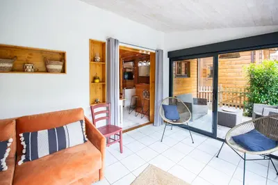 Coin salon dans l'établissement VILLAS les DUNES 1 - VILLAS les DUNES 2