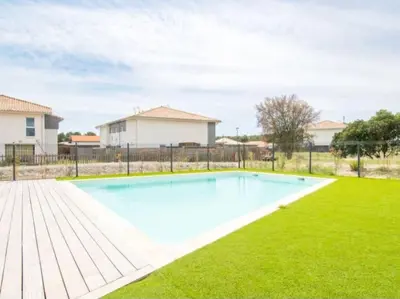 Piscine de l'établissement Appartement duplex Mimizan plage ou située à proximité