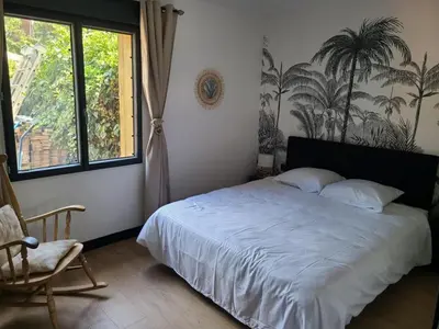 Un ou plusieurs lits dans un hébergement de l'établissement Maison avec piscine Pyla sur mer