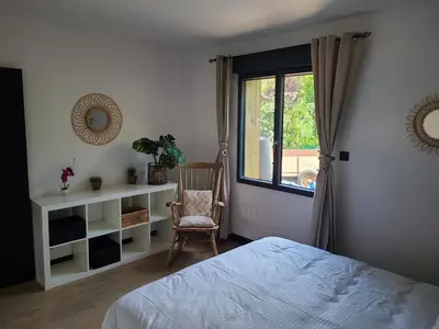 Un ou plusieurs lits dans un hébergement de l'établissement Maison avec piscine Pyla sur mer