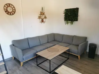 Coin salon dans l'établissement Maison pour 4 personnes