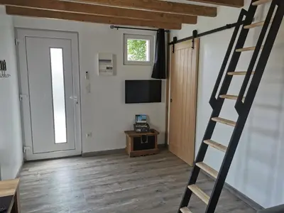 Télévision ou salle de divertissement dans l'établissement Maison pour 4 personnes