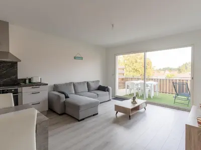 Coin salon dans l'établissement Appartement 4 pers. centre Mimizan, neuf avec parking - FR-1-50-143