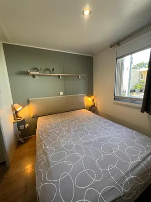 Un ou plusieurs lits dans un hébergement de l'établissement Bungalow à capbreton - Terrasse