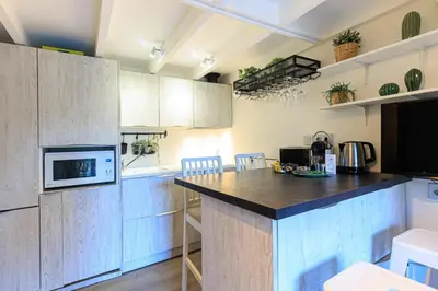 Cuisine ou kitchenette dans l'établissement Maison Kabâna - Welkeys