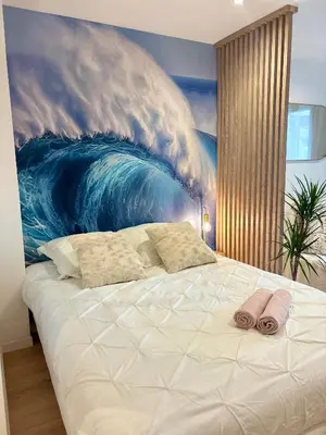 Un ou plusieurs lits dans un hébergement de l'établissement DUNE Océan Luxe Appartement, Accès Plage privé, Parking & Wifi 50m Océan Surf