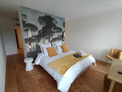 Un ou plusieurs lits dans un hébergement de l'établissement chambres d'hôtes numéro 1 Le Bedat côté jardin