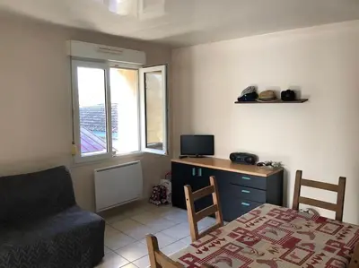 Télévision ou salle de divertissement dans l'établissement appartement la teste centre