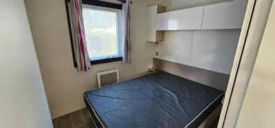 Un ou plusieurs lits dans un hébergement de l'établissement Location Mobilhome 3ch Mimizan Plage