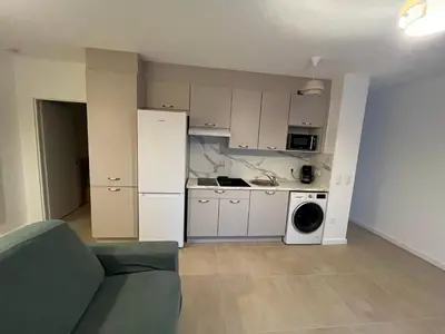 Cuisine ou kitchenette dans l'établissement Appartement rez-de-chaussée