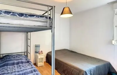 Un ou plusieurs lits dans un hébergement de l'établissement Villa Maëlyssia - Les villas du lac