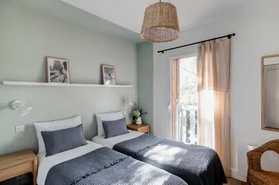 Un ou plusieurs lits dans un hébergement de l'établissement Villa Oyana au coeur du Moulleau Pyla sur Mer