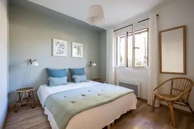Un ou plusieurs lits dans un hébergement de l'établissement Villa Eglantine à deux pas de la plage PYLA SUR MER