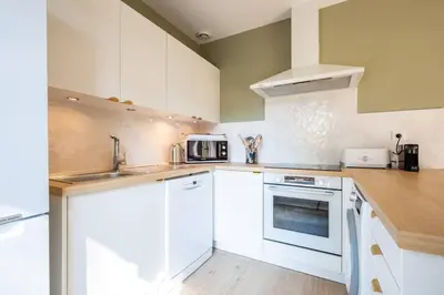 Cuisine ou kitchenette dans l'établissement Villa Dahlia à deux pas de la plage PYLA SUR MER