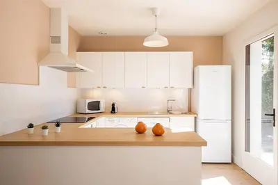 Cuisine ou kitchenette dans l'établissement Villa Camélia à deux pas de la plage PYLA SUR MER