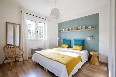 Un ou plusieurs lits dans un hébergement de l'établissement Villa Arbousière à deux pas de la plage PYLA SUR MER