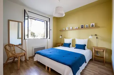 Un ou plusieurs lits dans un hébergement de l'établissement Villa Arbousière à deux pas de la plage PYLA SUR MER