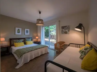 Un ou plusieurs lits dans un hébergement de l'établissement Villa Les Violettes à deux pas de la plage PYLA SUR MER