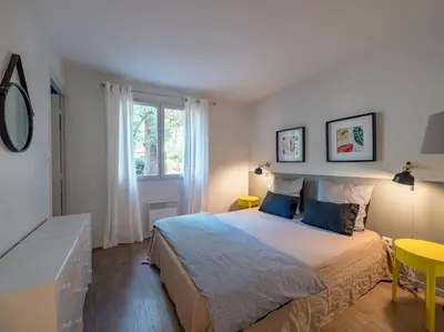Un ou plusieurs lits dans un hébergement de l'établissement Villa Les Pins à deux pas de la plage PYLA SUR MER
