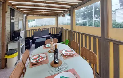 Coin salon dans l'établissement Mobil-home camping etoiles Les Dunes de Contis Landes Fun pass compris