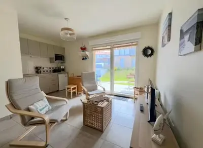 Télévision ou salle de divertissement dans l'établissement Appartement Remember à 700m de l'Océan