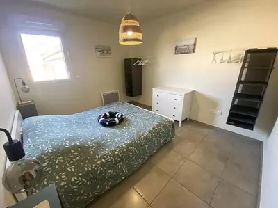 Un ou plusieurs lits dans un hébergement de l'établissement Appartement Remember à 700m de l'Océan