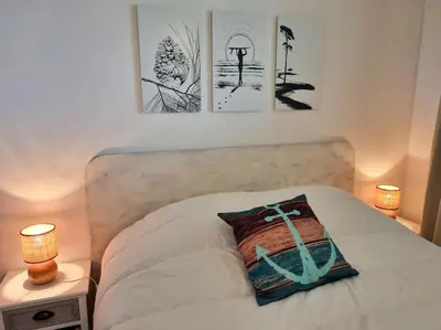 Un ou plusieurs lits dans un hébergement de l'établissement Les Landais-Appart cosy centre Mimizan plage 4p