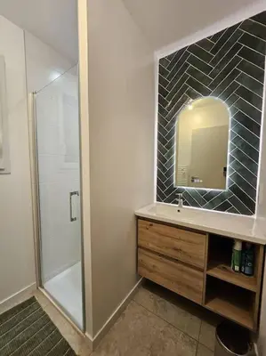 Salle de bains dans l'établissement Ozeanoa