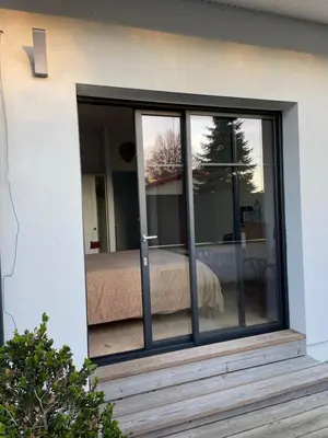 Un ou plusieurs lits dans un hébergement de l'établissement Charmante chambre chez l habitant