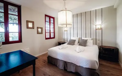 Un ou plusieurs lits dans un hébergement de l'établissement Maison Bleue Est 12 personnes