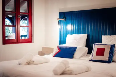 Un ou plusieurs lits dans un hébergement de l'établissement Maison Bleue Est 12 personnes