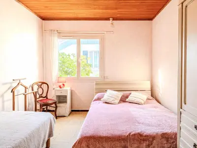 Un ou plusieurs lits dans un hébergement de l'établissement Holiday Home Trait d'Union by Interhome