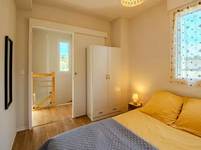 Un ou plusieurs lits dans un hébergement de l'établissement Apartment Soleil couchant by Interhome