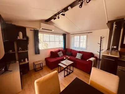 Coin salon dans l'établissement MH Camping la plage - MarieVa