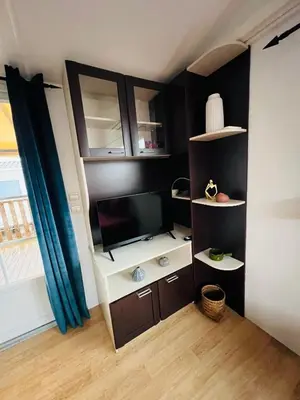 Cuisine ou kitchenette dans l'établissement MH Camping la plage - MarieVa