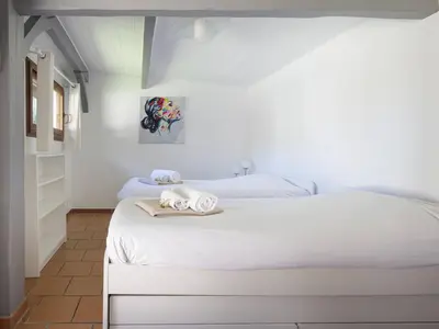 Un ou plusieurs lits dans un hébergement de l'établissement Villa élégante à Capbreton pour 12 personnes avec jardin - FR-1-791-27