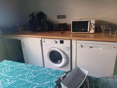 Cuisine ou kitchenette dans l'établissement Maison familiale avec jardin à Lahosse, 110 m²