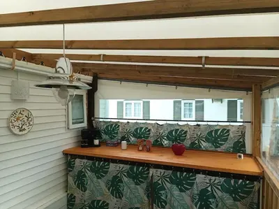 Coin salon dans l'établissement Mobil-Home 4 places dans les Landes