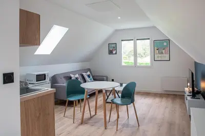 Cuisine ou kitchenette dans l'établissement Appartement moderne avec parking