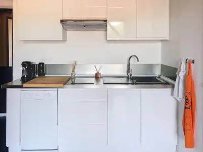 Cuisine ou kitchenette dans l'établissement Appartement proche de la plage