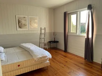 Un ou plusieurs lits dans un hébergement de l'établissement Villa avec piscine