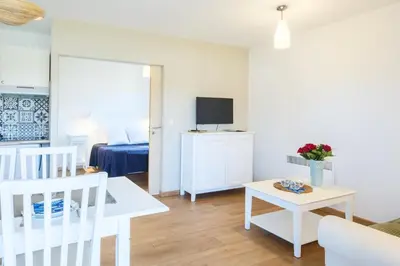 Télévision ou salle de divertissement dans l'établissement Appartement aux Cottages du Lac H70