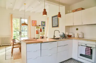 Cuisine ou kitchenette dans l'établissement Maison du golf proche centre, lac et plages